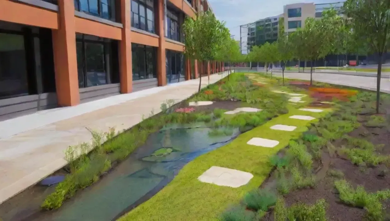 Paisaje urbano sostenible con techos verdes, gestión de aguas pluviales y espacios comunitarios